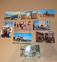 Fronts of nine postcards laid out in three rows