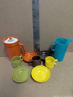 Full set showing nine pieces with scale