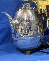 Full view of chrome GE coffee percolator with lid and handle