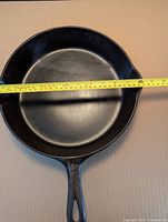 Top view with tape measure showing approx. 12 in. diameter