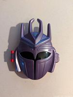 Front view of compact closed showing helmet design