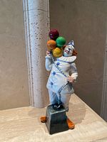 Full front view of Balloon Clown figurine on pedestal base