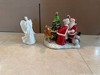 Both figurines side by side for size and context