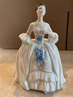 Front view of Royal Doulton Kelly HN 2478 figurine