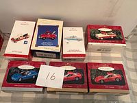 Seven Hallmark Keepsake vehicle ornament boxes