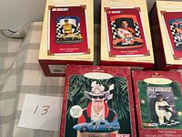 Five Hallmark Keepsake NASCAR ornament boxes – Matt Kenseth, Tony Stewart, Jimmie Johnson, Richard Petty, Dale Earnhardt – with lot number card