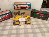 All six packaged die-cast items arranged on table