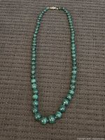 Full view of necklace laid flat