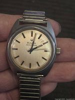 Front view showing dial, case and bracelet