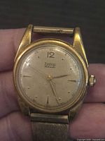 Front view of Zodiac Automatic wristwatch showing dial and gold-tone case