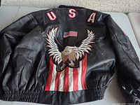 Full back view showing USA letters, eagle, stripes