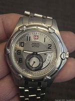 Front view showing dial details, logo, subdial and case