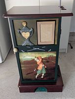 front view showing artwork, photo frame, golf ball knob, dimensions perspective