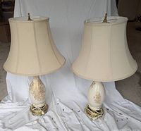 Front view of both porcelain lamps with shades