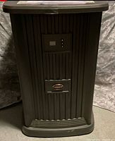 Front view showing control panel and housing