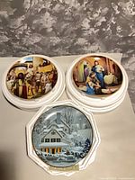 All three plates stacked showing designs