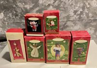 All six boxed Hallmark ornaments front view