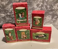Front view of five Hallmark ornament boxes