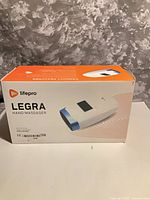 Front of original box showing Lifepro Legra hand massager image and branding