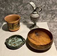 All four items grouped: wood bowl, planter, ewer, green dish