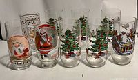 Front view of all nine Christmas tumblers