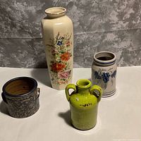 Four vases grouped front view