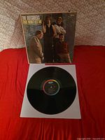 Front cover and vinyl disc displayed