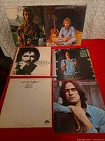 Six album covers laid out showing titles and artists