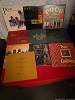 All ten Poco LP covers laid out on a table