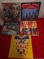 All five album covers laid out for overview