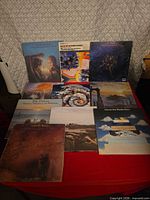 All nine records laid out in three rows