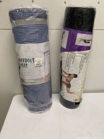 Both sealed mats standing upright