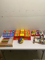All six preschool toys arranged on table