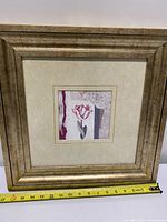 Front view showing entire framed print and measuring tape