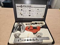 Open case showing complete Westward flaring kit components in tray