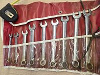 Full view of nine wrenches in red wrap