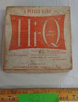 Closed game box showing Hi-Q branding and maker details