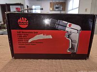 Box front showing Mac Tools 3/8" Reversible Drill AD540 with specs