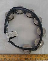 Top view of tambourine showing frame and jingles