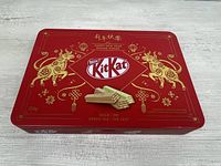 Top view of red KitKat Year of the Ox tin showing graphics and text