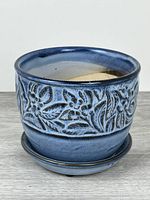 Blue ceramic flower pot with saucer front view