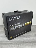Front angled view of boxed EVGA SuperNOVA 1300 G2 power supply