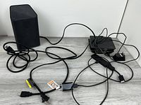 Group shot of modem, three streaming boxes and cables