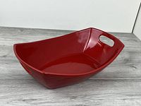 Angled view showing exterior shape and one handle