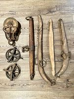 All items grouped: four yokes, three pulleys