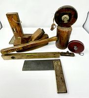 Group shot of all nine antique carpentry tools