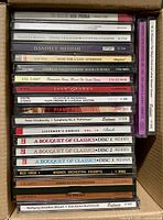 Box showing spine titles of main stack of CDs