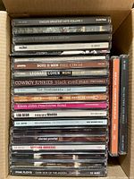 Stack of CD spines showing majority of titles