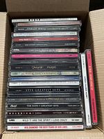 Overview of box showing full stack of CD spines