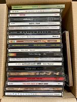 Stack of CD spines showing majority of album titles